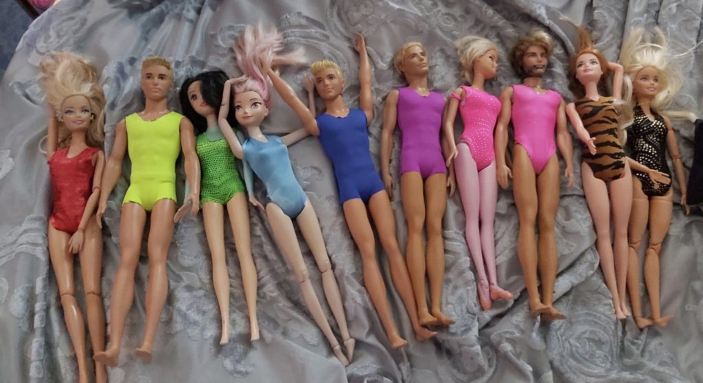 Rainbow parrot design studio. Making outfits for barbies